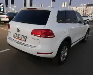 Volkswagen Touareg 2012 car hire in Crimea, featuring ✓ Diesel fuel and 245 horsepower ➤ Starting from  per day.