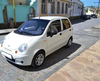 Front view of a rental Daewoo Matiz in Yevpatoriya, Crimea ✓ Car #3199. ✓ Manual TM ✓ 0 reviews.