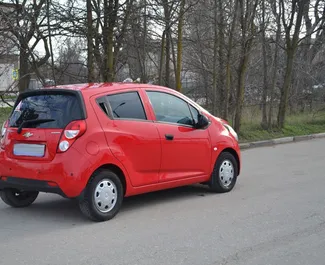Chevrolet Spark 2013 car hire in Crimea, featuring ✓ Petrol fuel and 90 horsepower ➤ Starting from 1534 RUB per day.