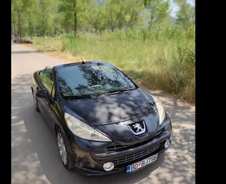 Front view of a rental Peugeot 207cc in Budva, Montenegro ✓ Car #3141. ✓ Manual TM ✓ 1 reviews.