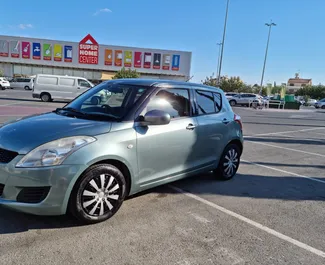 Front view of a rental Suzuki Swift in Limassol, Cyprus ✓ Car #3295. ✓ Automatic TM ✓ 1 reviews.
