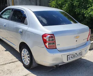 Chevrolet Cobalt 2013 car hire in Crimea, featuring ✓ Petrol fuel and 106 horsepower ➤ Starting from 1907 RUB per day.