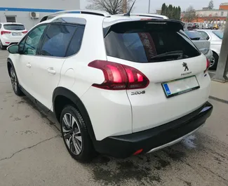 Front view of a rental Peugeot 2008 in Ljubljana, Slovenia ✓ Car #3404. ✓ Automatic TM ✓ 0 reviews.