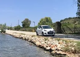 Front view of a rental Hyundai i10 in Crete, Greece ✓ Car #3483. ✓ Automatic TM ✓ 0 reviews.