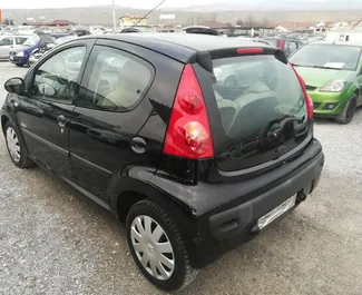 Front view of a rental Peugeot 107 at Burgas Airport, Bulgaria ✓ Car #3626. ✓ Automatic TM ✓ 0 reviews.