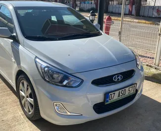 Front view of a rental Hyundai Accent Blue at Antalya Airport, Turkey ✓ Car #3810. ✓ Automatic TM ✓ 0 reviews.