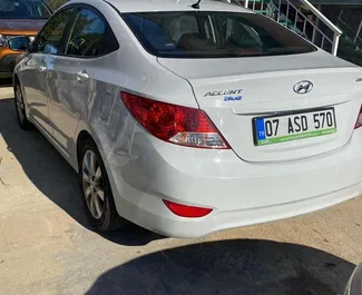Прокат машины Hyundai Accent Blue №3810 (Автомат) в аэропорту Анталии, с двигателем 1,6л. Бензин ➤ Напрямую от Сефа в Турции.