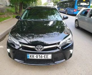 Front view of a rental Toyota Camry in Tbilisi, Georgia ✓ Car #3859. ✓ Automatic TM ✓ 0 reviews.