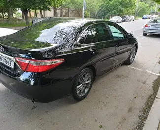 Toyota Camry 2015 car hire in Georgia, featuring ✓ Petrol fuel and 181 horsepower ➤ Starting from 145 GEL per day.