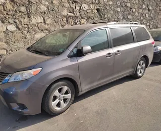 Front view of a rental Toyota Sienna in Tbilisi, Georgia ✓ Car #3681. ✓ Automatic TM ✓ 1 reviews.