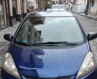 Front view of a rental Honda Fit in Tbilisi, Georgia ✓ Car #3679. ✓ Automatic TM ✓ 0 reviews.