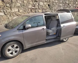Toyota Sienna rental. Comfort, Minivan Car for Renting in Georgia ✓ Deposit of 810 GEL ✓ TPL, CDW insurance options.