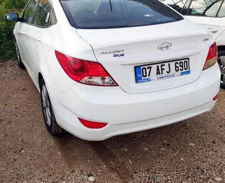 Прокат машины Hyundai Accent Blue №3901 (Автомат) в аэропорту Анталии, с двигателем 1,6л. Дизель ➤ Напрямую от Ридван в Турции.