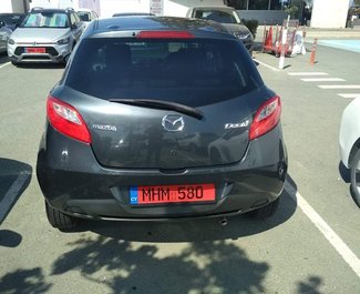 Недорогой Mazda Demio, 12.0 литров для аренды в  Кипр