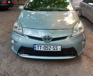 Front view of a rental Toyota Prius at Tbilisi Airport, Georgia ✓ Car #4042. ✓ Automatic TM ✓ 0 reviews.