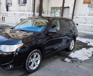 Front view of a rental Mitsubishi Outlander Xl in Tbilisi, Georgia ✓ Car #4096. ✓ Automatic TM ✓ 1 reviews.