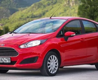 Ford Fiesta 2016 car hire in Montenegro, featuring ✓ Petrol fuel and 105 horsepower ➤ Starting from 17 EUR per day.