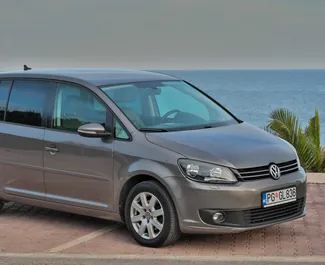 Front view of a rental Volkswagen Touran in Budva, Montenegro ✓ Car #4210. ✓ Automatic TM ✓ 6 reviews.