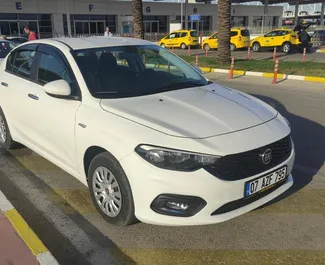 Front view of a rental Fiat Egea at Antalya Airport, Turkey ✓ Car #4225. ✓ Manual TM ✓ 2 reviews.