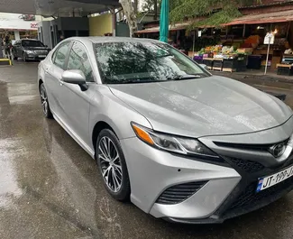 Front view of a rental Toyota Camry in Tbilisi, Georgia ✓ Car #4164. ✓ Automatic TM ✓ 0 reviews.