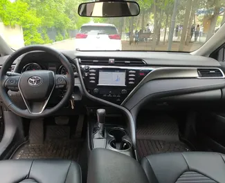 Petrol 2.5L engine of Toyota Camry 2019 for rental in Tbilisi.
