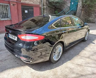 Ford Fusion 2017 available for rent at Tbilisi Airport, with unlimited mileage limit.