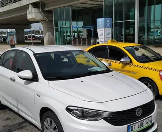 Front view of a rental Fiat Egea at Antalya Airport, Turkey ✓ Car #4181. ✓ Manual TM ✓ 0 reviews.