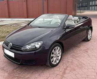 Front view of a rental Volkswagen Golf Cabrio in Becici, Montenegro ✓ Car #4273. ✓ Automatic TM ✓ 1 reviews.
