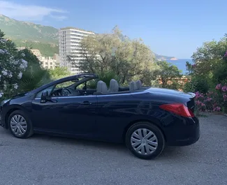 Front view of a rental Peugeot 308cc in Becici, Montenegro ✓ Car #4286. ✓ Automatic TM ✓ 3 reviews.