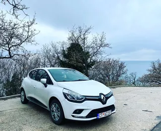 Front view of a rental Renault Clio 4 in Becici, Montenegro ✓ Car #4278. ✓ Manual TM ✓ 0 reviews.
