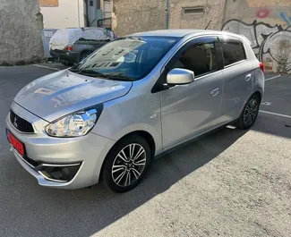 Front view of a rental Mitsubishi Mirage in Larnaca, Cyprus ✓ Car #4377. ✓ Automatic TM ✓ 0 reviews.