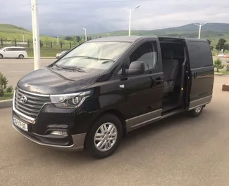 Hyundai H1 2019 car hire in Georgia, featuring ✓ Diesel fuel and 175 horsepower ➤ Starting from 220 GEL per day.