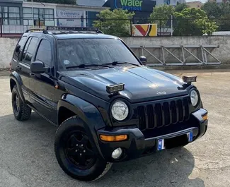 Front view of a rental Jeep Cherokee in Tirana, Albania ✓ Car #4591. ✓ Automatic TM ✓ 0 reviews.