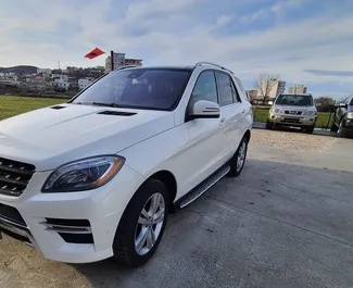 Front view of a rental Mercedes-Benz ML350 at Tirana airport, Albania ✓ Car #4701. ✓ Automatic TM ✓ 0 reviews.