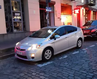 Front view of a rental Toyota Prius in Tbilisi, Georgia ✓ Car #4458. ✓ Automatic TM ✓ 1 reviews.