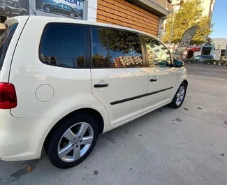 Volkswagen Touran 2015 car hire in Albania, featuring ✓ Diesel fuel and 140 horsepower ➤ Starting from 43 EUR per day.