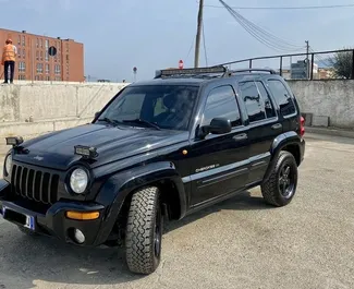 Car Hire Jeep Cherokee #4591 Automatic in Tirana, equipped with 2.8L engine ➤ From Xhesjan in Albania.