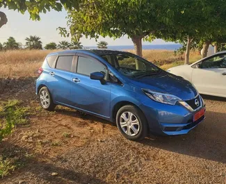 Front view of a rental Nissan Note in Pomos, Cyprus ✓ Car #4467. ✓ Automatic TM ✓ 0 reviews.