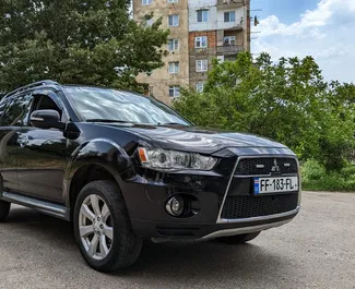 Front view of a rental Mitsubishi Outlander Xl in Tbilisi, Georgia ✓ Car #4201. ✓ Automatic TM ✓ 1 reviews.