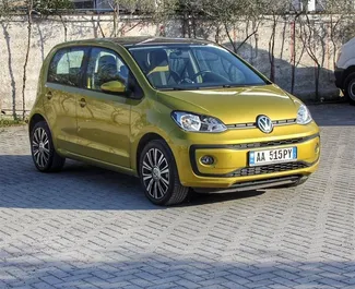 Front view of a rental Volkswagen Up in Tirana, Albania ✓ Car #4573. ✓ Automatic TM ✓ 0 reviews.