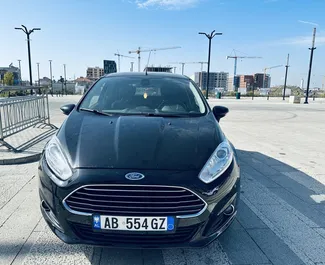Front view of a rental Ford Fiesta Ecoboost in Tirana, Albania ✓ Car #4718. ✓ Manual TM ✓ 0 reviews.