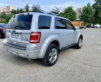 Ford Escape rental. Comfort, SUV, Crossover Car for Renting in Georgia ✓ Without Deposit ✓ TPL, CDW, SCDW, Passengers, Theft insurance options.