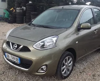 Front view of a rental Nissan Micra in Tirana, Albania ✓ Car #4530. ✓ Automatic TM ✓ 0 reviews.