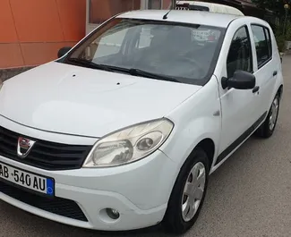 Front view of a rental Dacia Sandero in Tirana, Albania ✓ Car #4521. ✓ Manual TM ✓ 0 reviews.