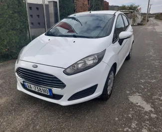 Front view of a rental Ford Fiesta in Tirana, Albania ✓ Car #4610. ✓ Manual TM ✓ 1 reviews.
