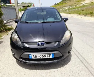 Front view of a rental Ford Fiesta in Tirana, Albania ✓ Car #4612. ✓ Manual TM ✓ 2 reviews.