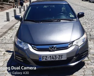 Front view of a rental Honda Insight in Tbilisi, Georgia ✓ Car #4454. ✓ Automatic TM ✓ 0 reviews.