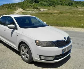 Front view of a rental Skoda Rapid in Tirana, Albania ✓ Car #4628. ✓ Manual TM ✓ 0 reviews.