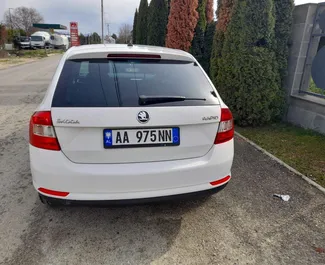 Skoda Rapid Spaceback 2015 car hire in Albania, featuring ✓ Diesel fuel and 125 horsepower ➤ Starting from 23 EUR per day.