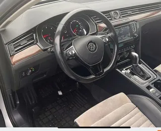 Interior of Volkswagen Passat for hire in Montenegro. A Great 5-seater car with a Automatic transmission.